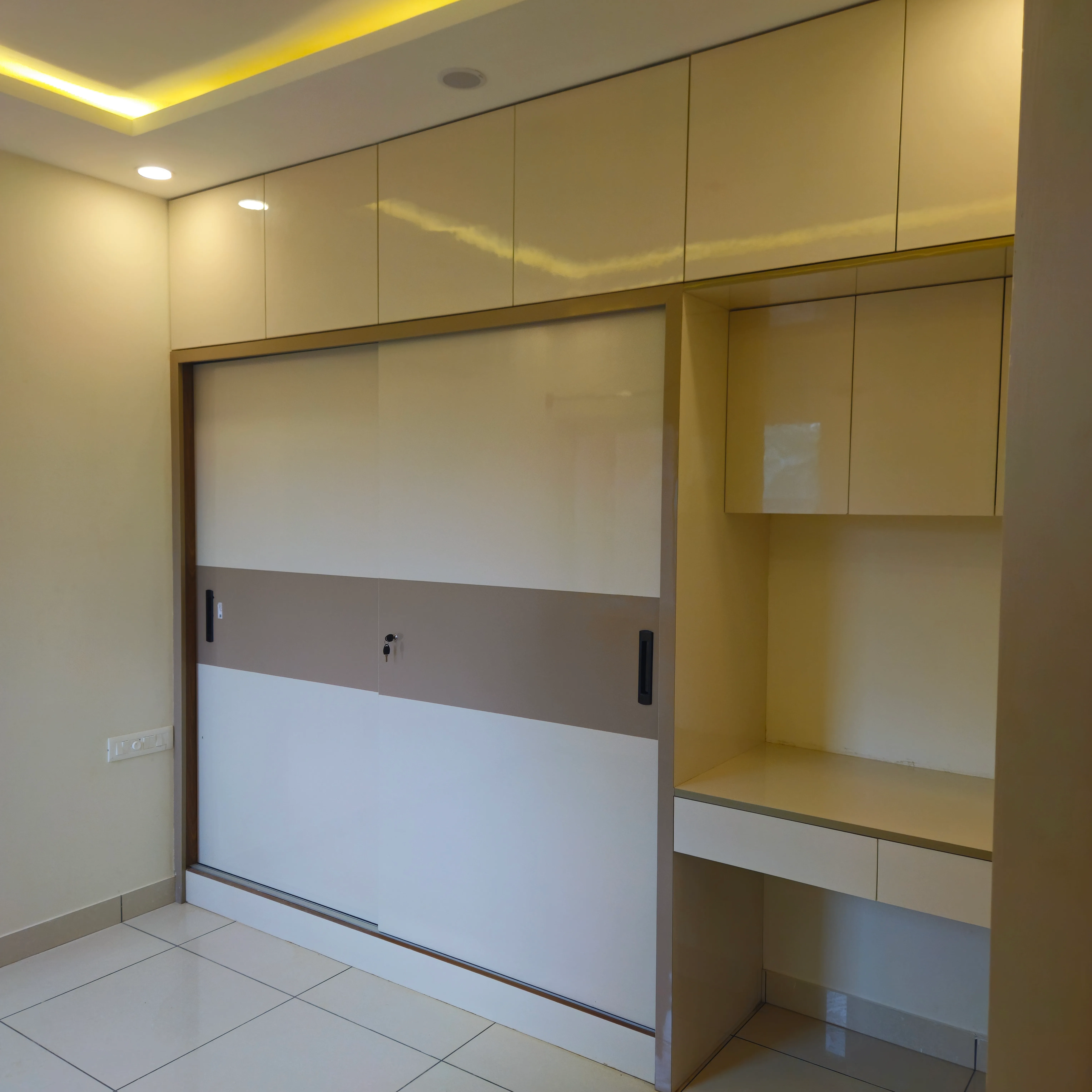 Corner wardrobe with mirror and lighting