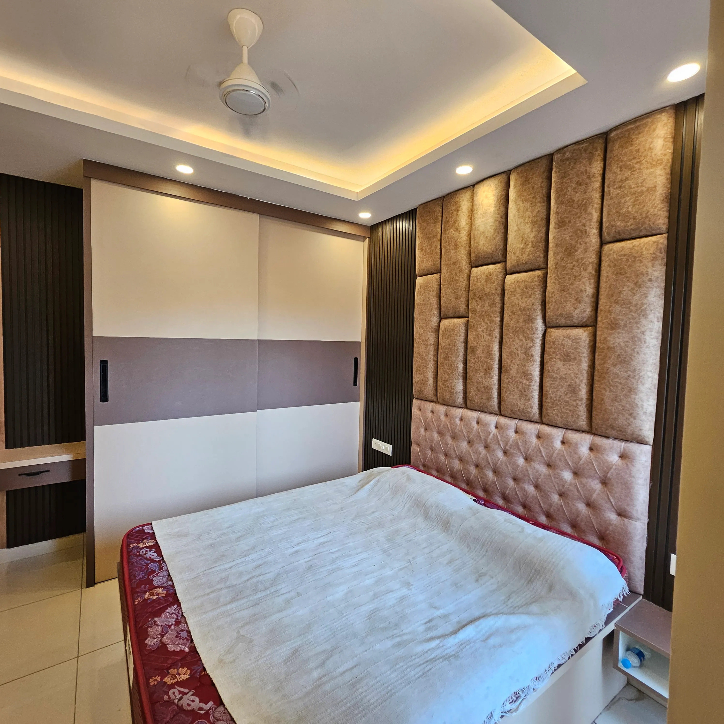 Corner wardrobe with mirror and lighting